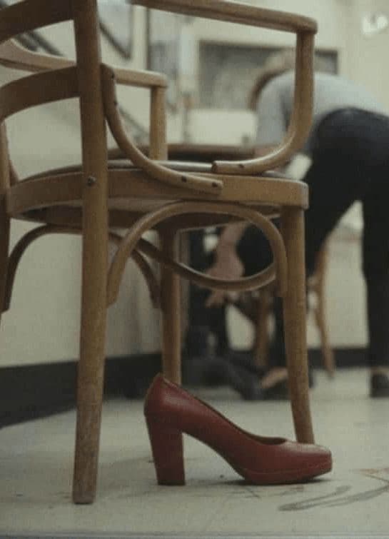 Crimson Heel on Linoleum — photograph by Yuri Petrenko — MODULAR · 13 × 18 cm limited edition of 10