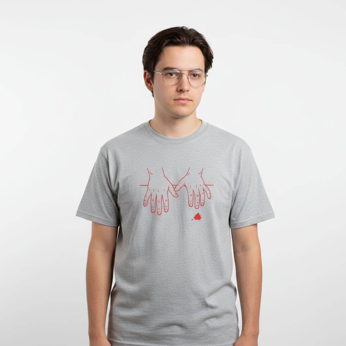 fading light, calloused hands printed on a t-shirt, worn
