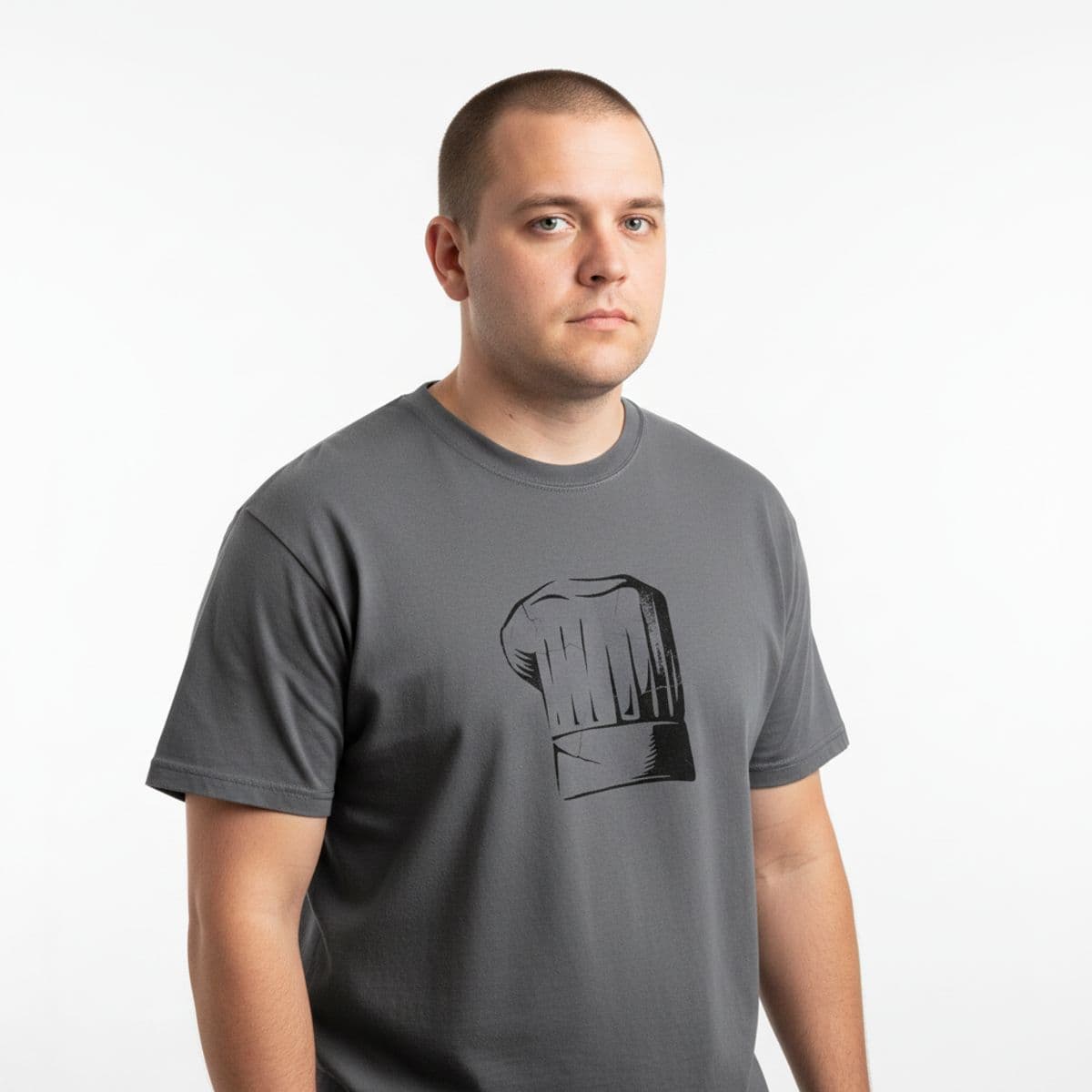 Reaching for the Macaroni printed on a t-shirt, worn