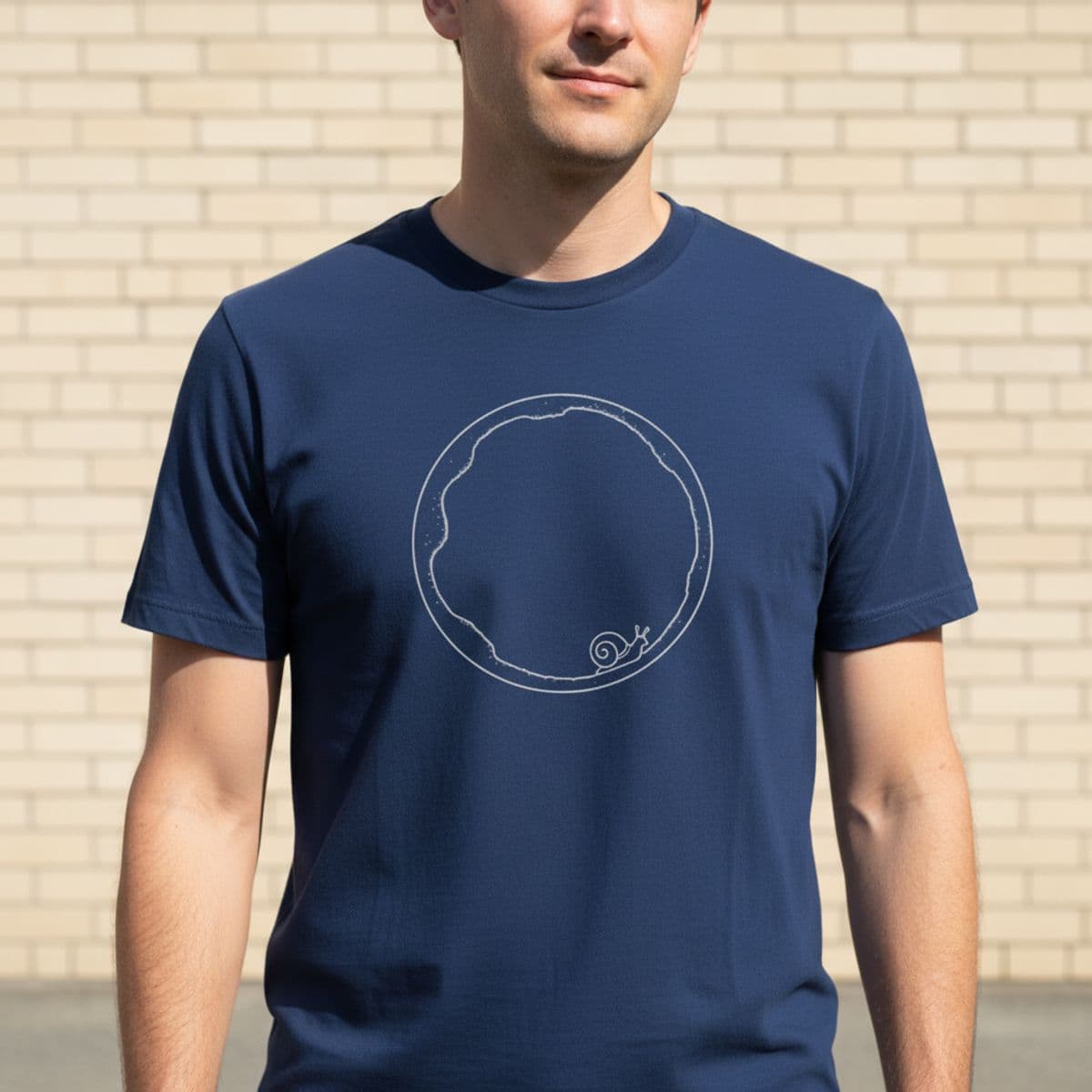 Sasha Traces the Rings printed on a t-shirt, worn
