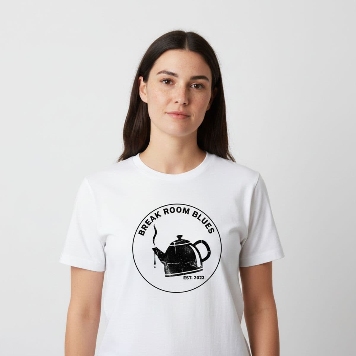 The Kettle Whistled Early printed on a t-shirt, worn