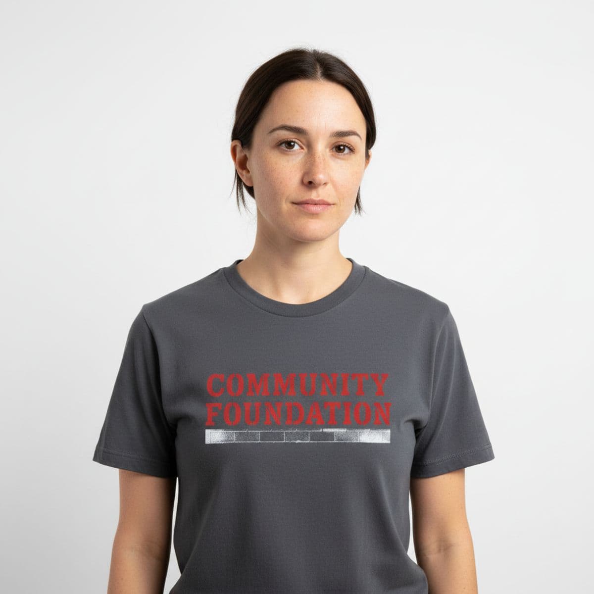 The Promotion Was Confirmed printed on a t-shirt, worn