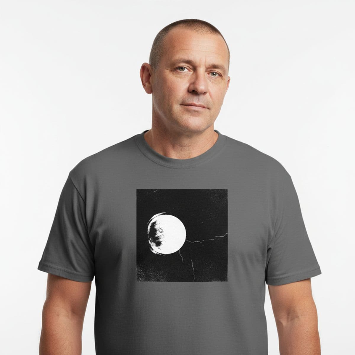 The Tired Thumb printed on a t-shirt, worn