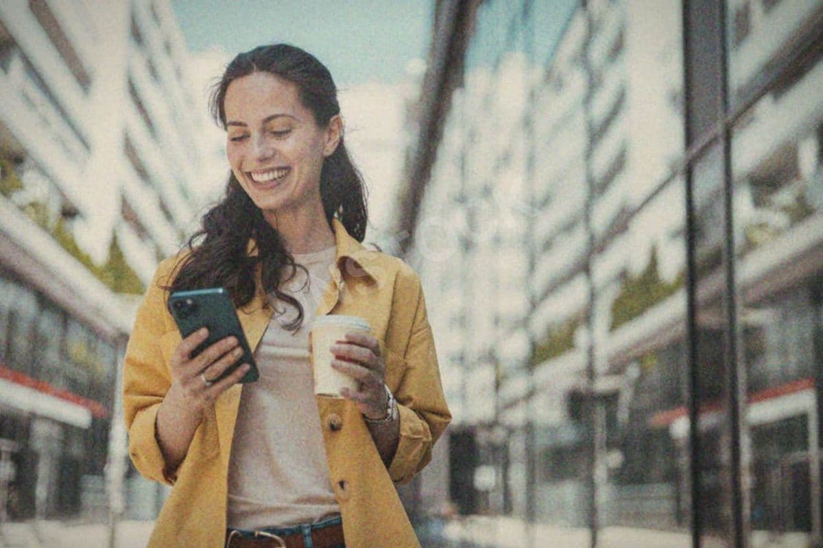 woman-walking-on-the-sidewalk-at-urban-setting-and-talking-on-the-phone.jpg — Inés Corral · MODULAR one-of-a-kind original