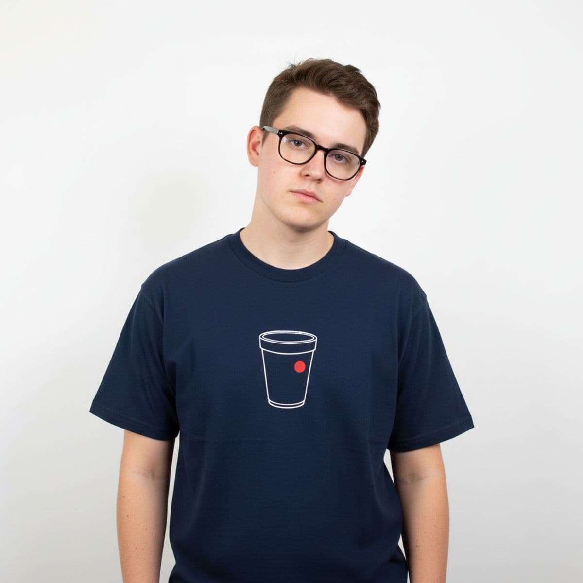 Office Kitchenette with a Leaking Cup printed on a t-shirt, worn