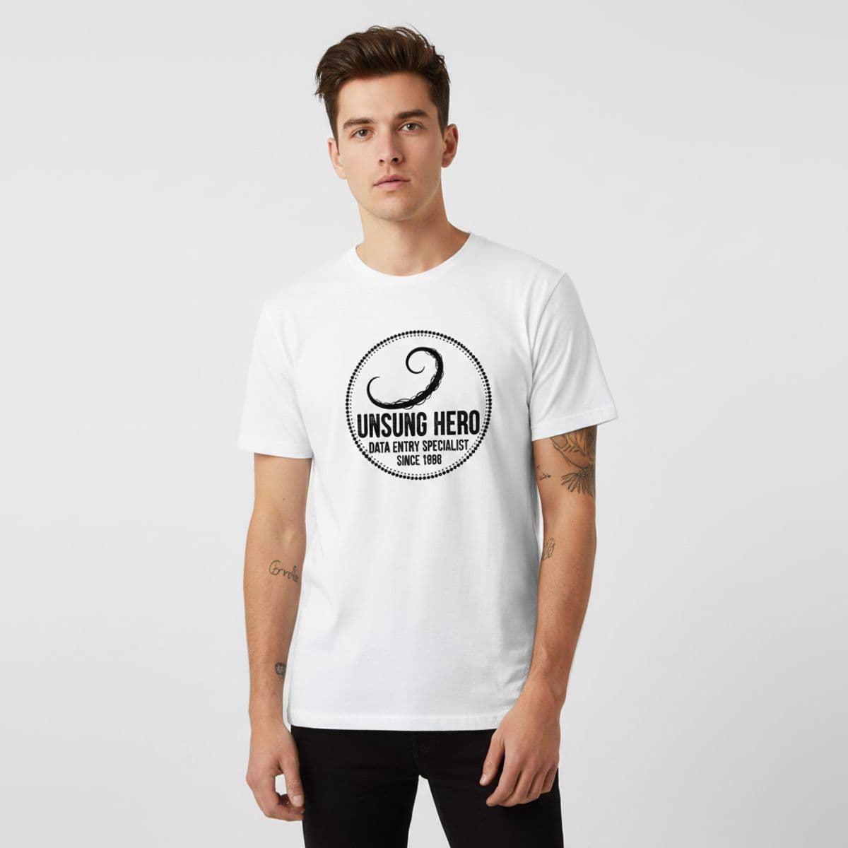 The Data Entry Specialist Blinks printed on a t-shirt, worn