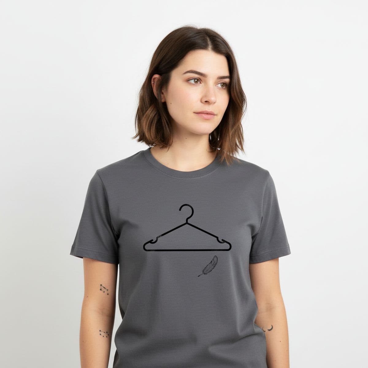 The Overturned Bucket's Broken Handle printed on a t-shirt, worn