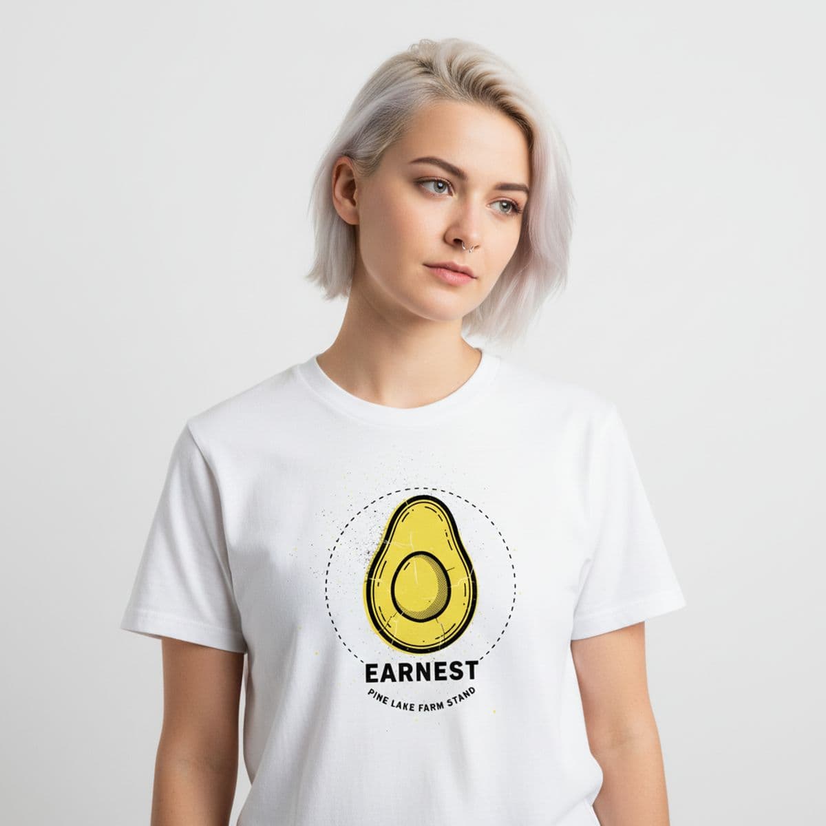 The Young Vendor Gripping an Avocado printed on a t-shirt, worn